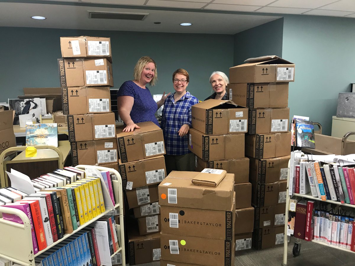 WinnLib's tweet photo. Look at these smiling faces, ready to process all of these NEW BOOKS! Coming soon to our shelves...

#winnlib #librarylife #newbooks #excitedaboutbooks #boxtower #librarybooks #librarytechservices #librariesofinstagram https://t.co/47HAt9Gnp4