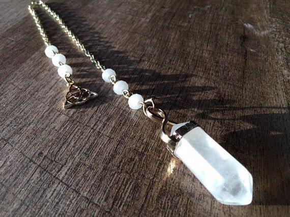 EclecticCharms's tweet photo. Clear Quartz #pendulum with a gold plated #triquetra charm 💛 ON SALE! Enjoy 15% off until June 9th! #etsy #witchy #pendulums #quartz #clearquartz #divination #dowsing #witchythings #celtic #celticknot #etsyfinds #etsyshop #onsale https://t.co/9qRE9w9p2Y