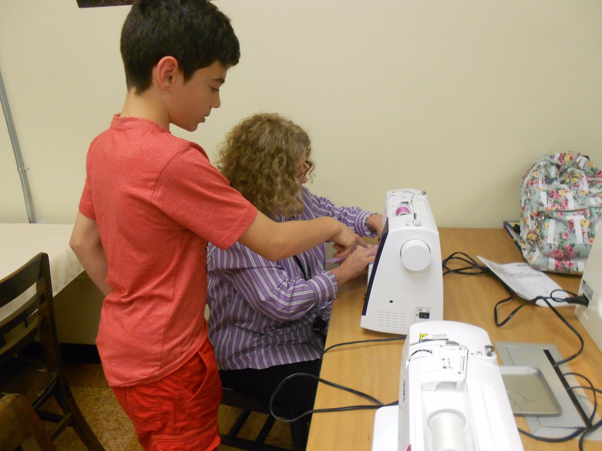 LibraryatHHS's tweet photo. Stress-relief wkshps continue to be a hit! Lots of sewing today making lavender-scented heating pads for Mother’s Day. Young men manning the machines, stdts helping tchrs, peers helping peers—and we ran out of supplies! To be con’t tomorrow. @Makerspaces_com @HHSBears #realmensew https://t.co/pAuZcWLKhZ