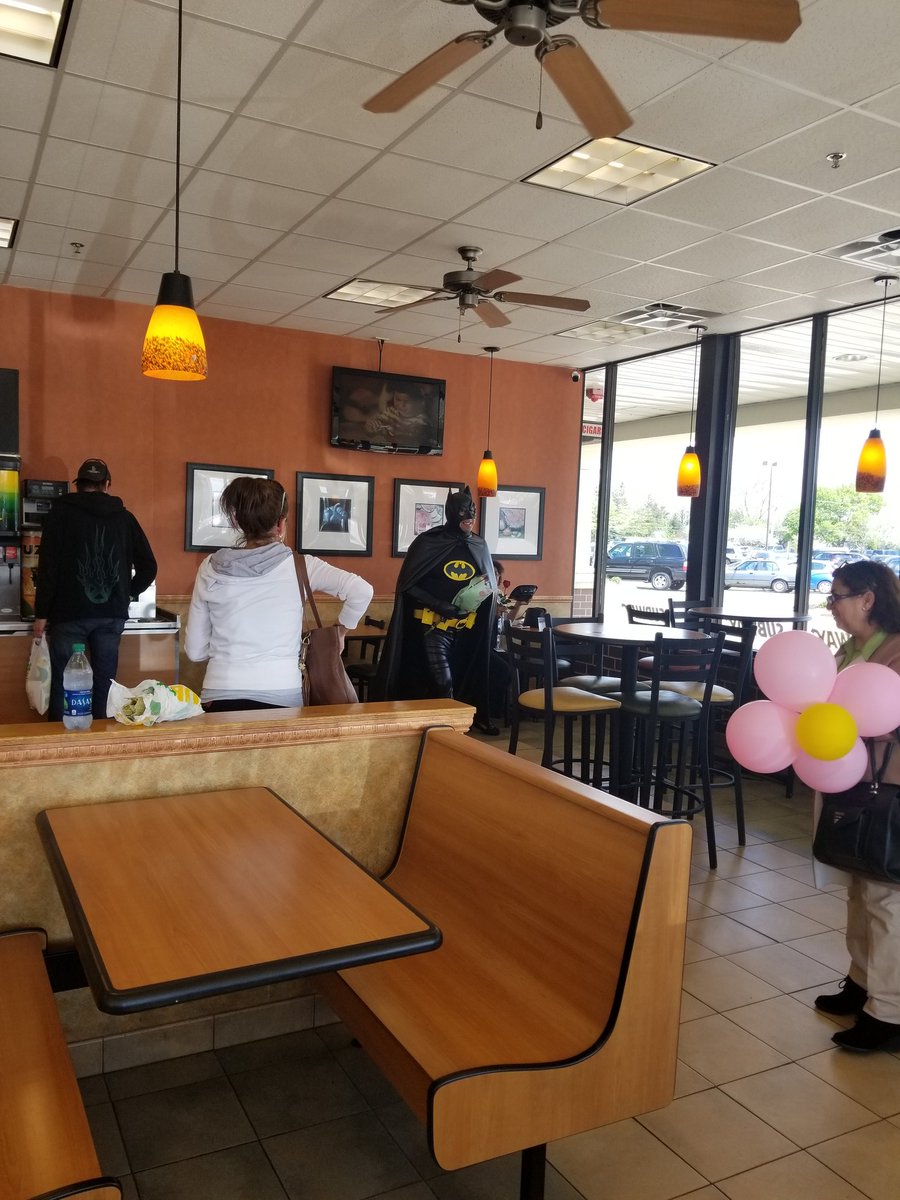 SocialGrl1's tweet photo. When Batman comes into Subway to give all of the ladies roses....I hope he was doing it for social because this is a win! #Batman #roses #subway https://t.co/hy8vjb8sEV