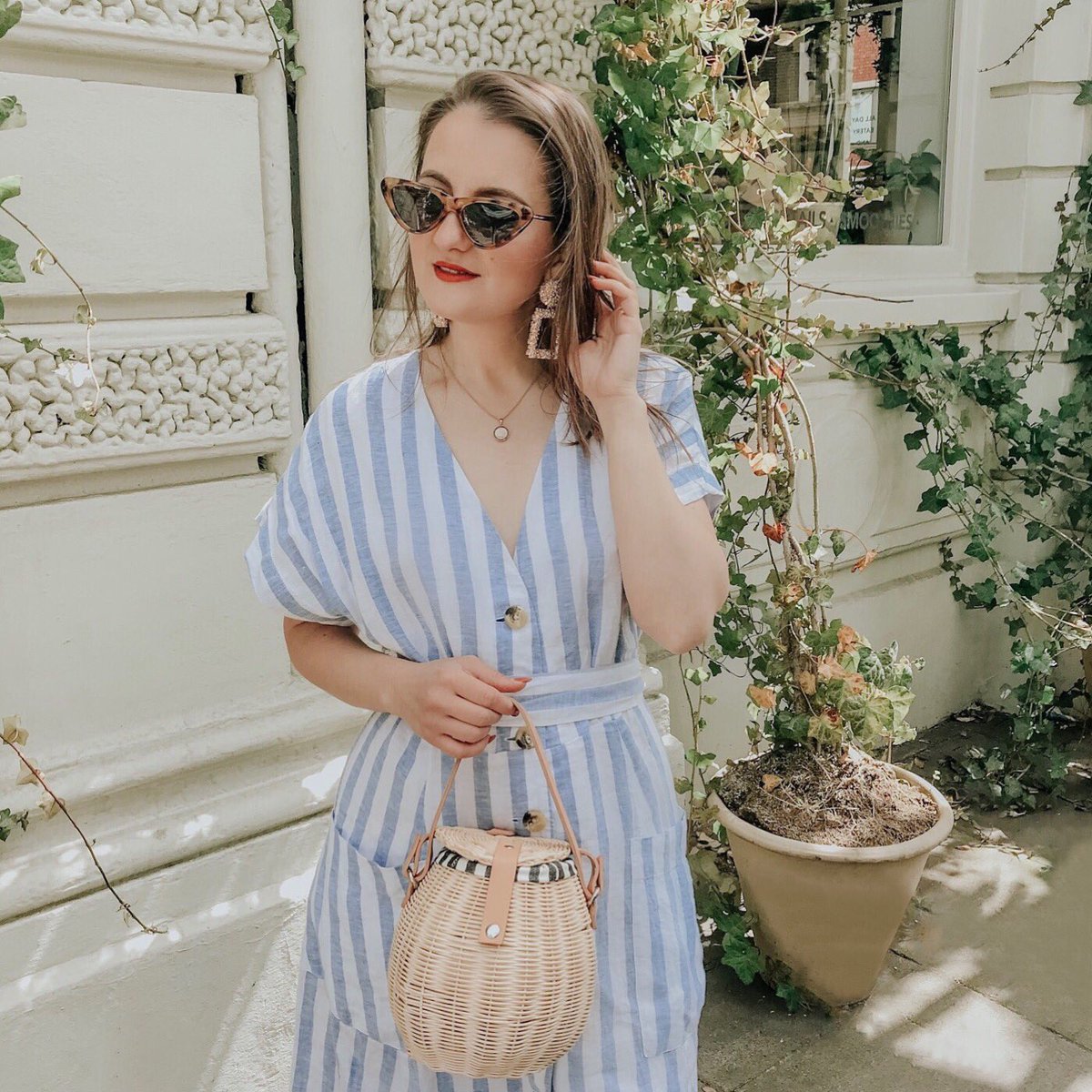 Linen dresses and straw bags are my Summer uniform ✨ Outfit details all available via this link: liketk.it/2vHHl. The easiest way to shop my Instagram looks, download the app now!