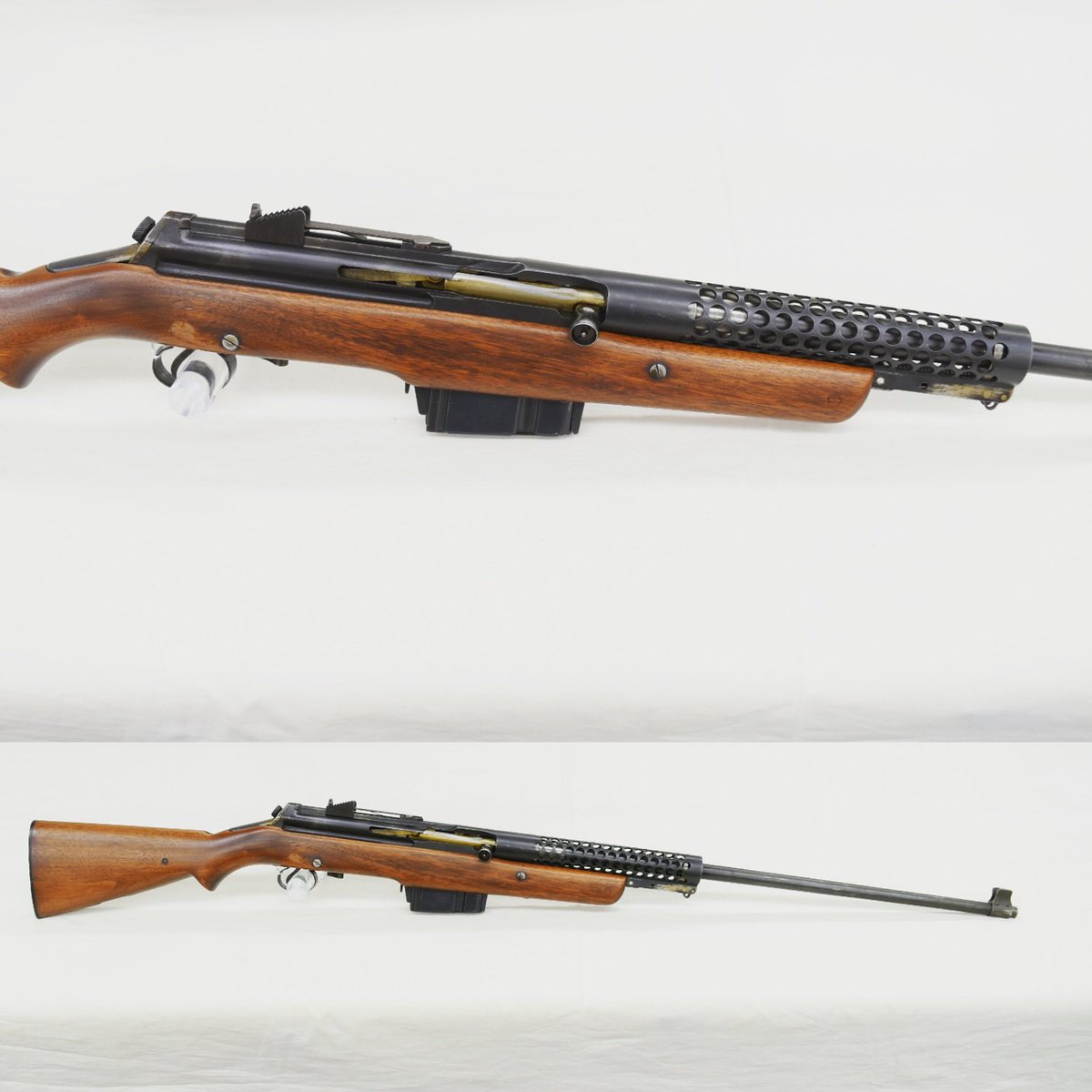 The M1941 Johnson rifle adopted in limited numbers by the Marine Corps had a distinctive pot belly stock and rotary magazine, but there was also a vertical magazine version.