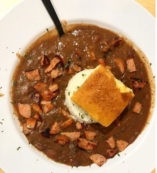 FlyGPT's tweet photo. Hungry for dinner? The Gulf Coast Grill & Taproom at GPT has you covered. Try the red beans and rice topped with cornbread — it’s the best in town!
#airportfood #Travel #flygpt https://t.co/QmAjrGFQJK