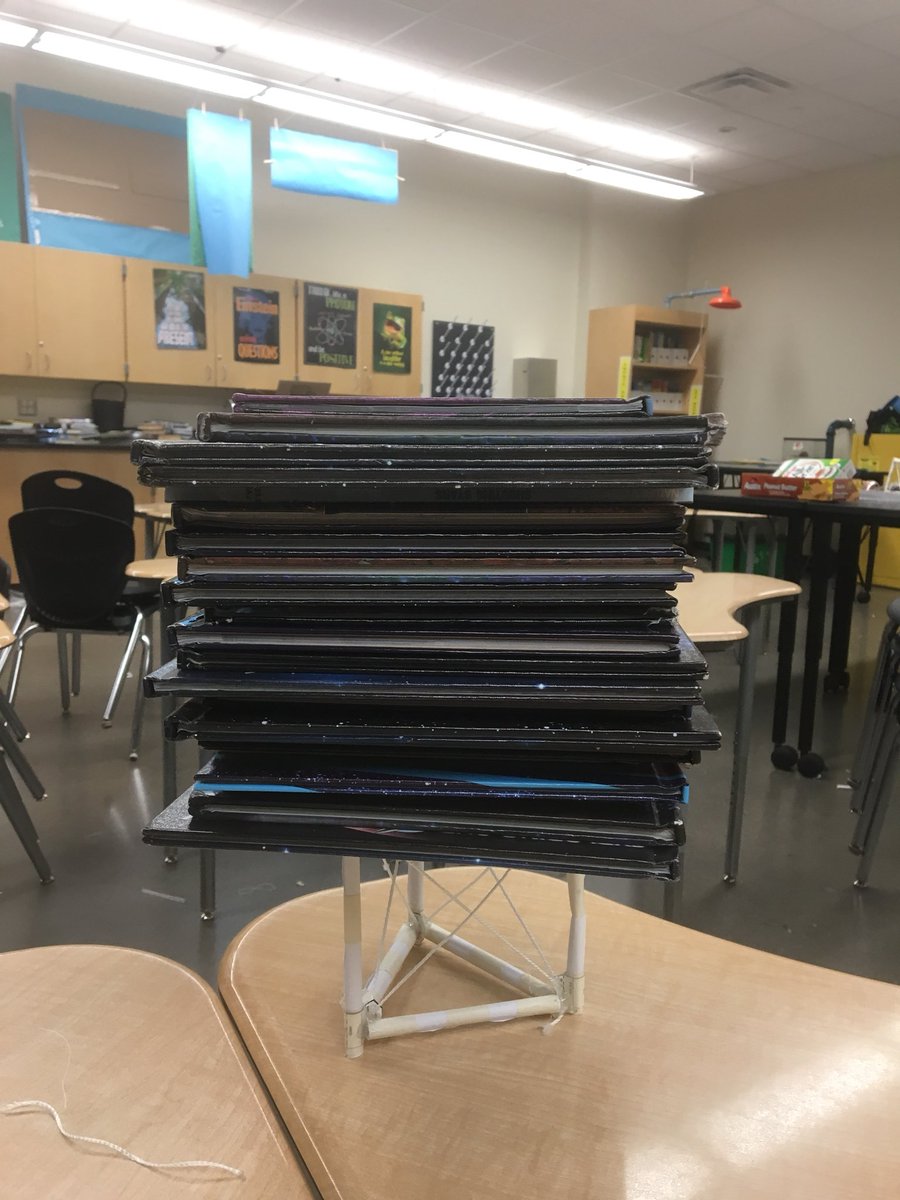 Solano_science's tweet photo. How do @NASA engineers design strong structures? My 7th grade engineers could tell you! 27 books stacked! @netzeroJMS https://t.co/shmSVZJdbn