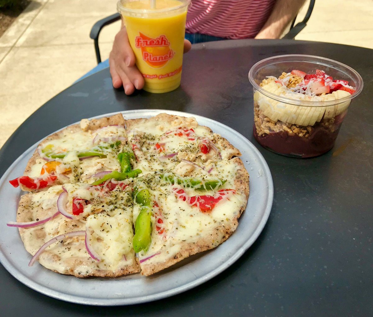 FreshPlanetOhio's tweet photo. It's time to enjoy the patio !!  @ Liquid Fresh Planet ... These customers are enjoying a Fresh Strawberry Banana Acai Bowl , with a Chicken Peppercorn Pizza and a Pineapple Creamsicle Whole Fruit Smoothie ... Never any syrups , sugary sherbet or ice fillers in our smoothies !😊 https://t.co/CFZnQOMJiZ