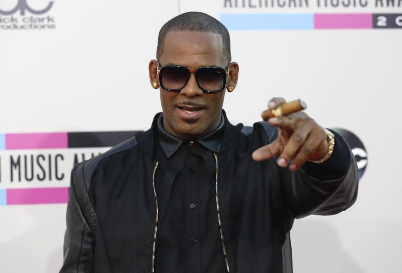 Reuters's tweet photo. Spotify removes R. Kelly's music from playlists after boycott campaign https://t.co/RJrGwYnbrb https://t.co/JI1BbYQzfD