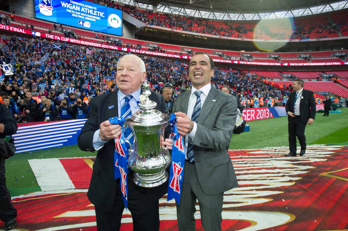 LaticsOfficial's tweet photo. 🏆 Five years ago today...

The dream became a reality. Wigan Athletic etched onto the famous old trophy.

#wafc 🔵⚪️ https://t.co/5Y1E9lOrQN