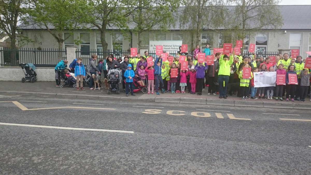 SPDD17's tweet photo. Great turnout at today’s peaceful protest despite the bad weather. The message is loud and clear. Child safety must be prioritised. #Donabate residents will not accept the current unsafe conditions our children face travelling to and from school on a daily basis. #childsafety https://t.co/wf0x7xJrYB