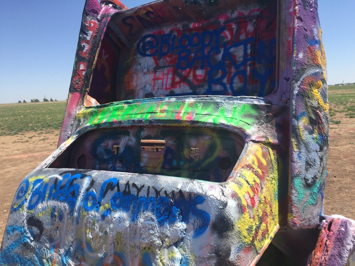 chrissy_graven's tweet photo. A visit with one of our largest AGRIS customers wouldn’t be complete without a trip to the Cadillac Ranch! #cadillacranch @ag_producers @MikeTGreenstone @greenstonesys https://t.co/v5VdFpeMst