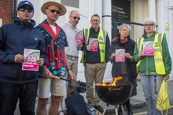 socialistworker's tweet photo. Maths teacher Steve was on strike at #TowerHamlets College. “There is so much money being chucked about in this place,” he said. “It’s rubbish to say they can’t afford to pay us more." #TowerHamletsCollege #HackneyCollege https://t.co/W11zNMgORZ https://t.co/D4y53m2MBc