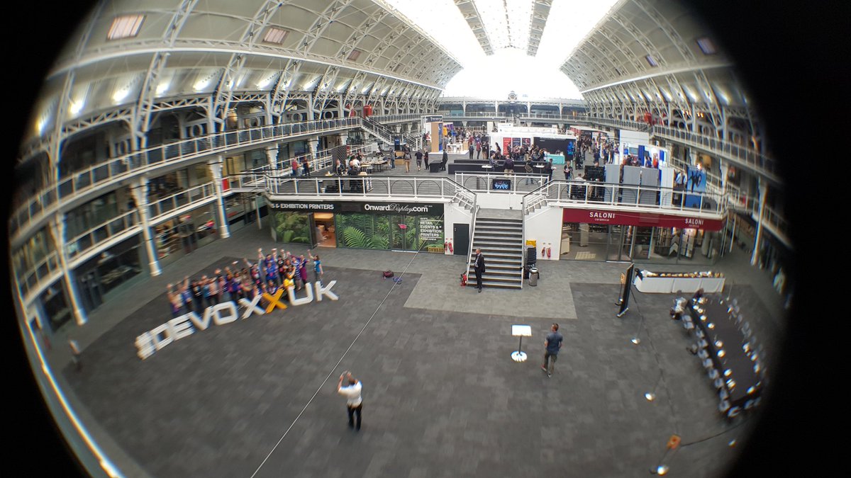 sjwarner's tweet photo. @DevoxxUK #BuildSomethingThatMatters with diversity in tech! Managed a pic of the @jduchess group by the #devoxxuk sign with my fish-eye lens #outsystemsdev https://t.co/BFCxafT48M
