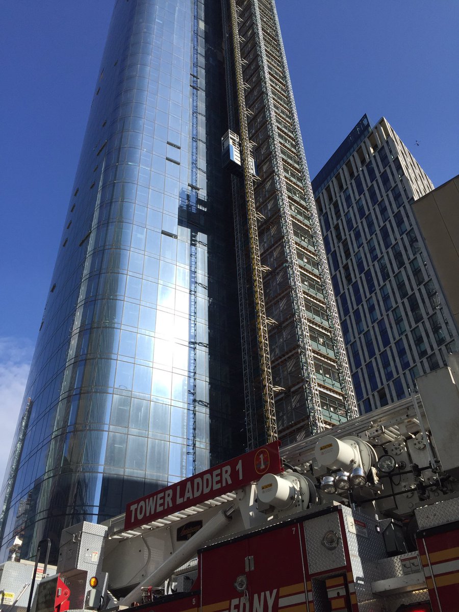 FDNY's tweet image. #FDNY members from #Rescue1 #Squad18 have removed 2 workers from a suspended scaffold, 111 Murray St. Manhattan.