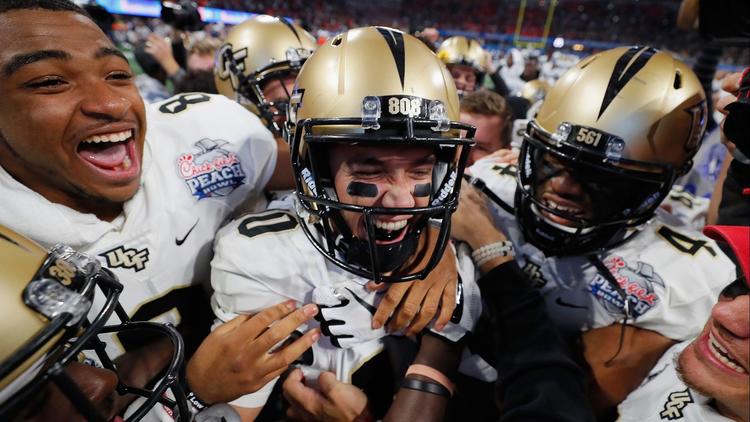 osknights's tweet photo. #UCF breaks fundraising record after undefeated 2017 football season. https://t.co/8xHzLNvFeX https://t.co/eBq4oXFvNC