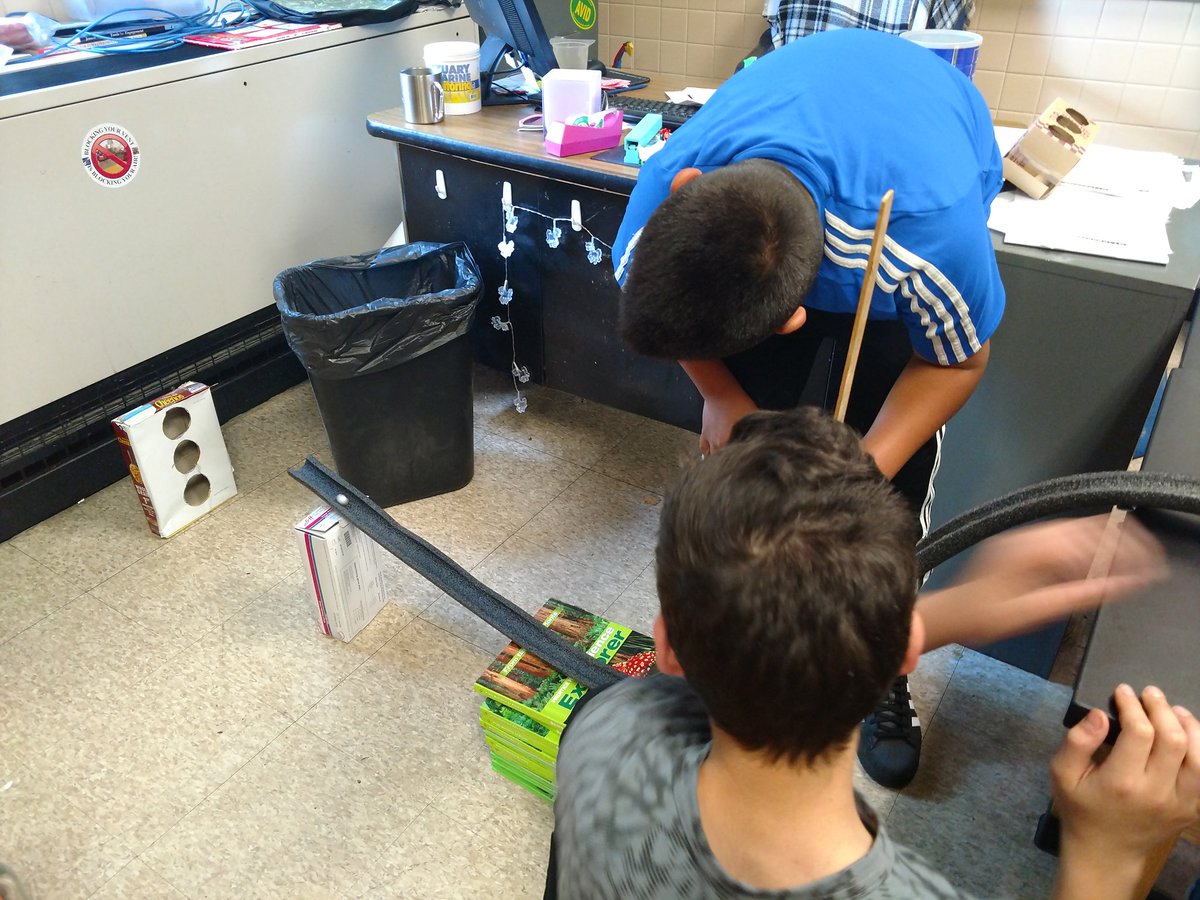SavageScienceDM's tweet photo. Students building skee ball ramps to study the interaction between mass and gravitational potential energy https://t.co/J3JQmQtehn