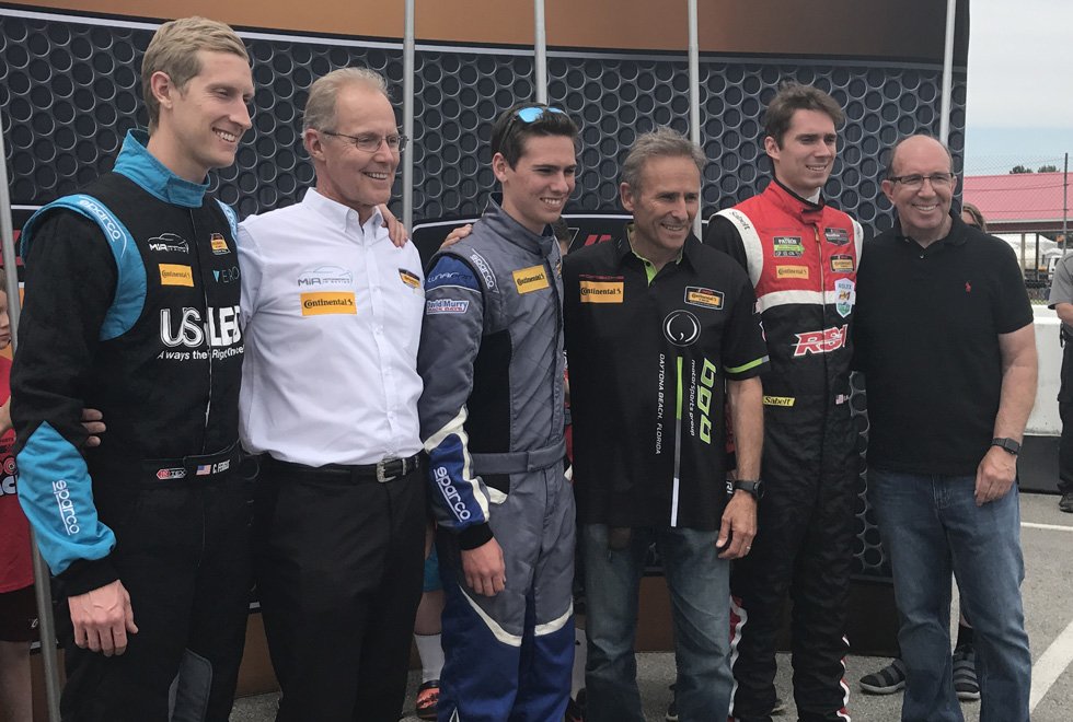 IMSA's tweet photo. #FlashbackFriday: Several @continentaltire Challenge drivers and their fathers posed for a picture at @Mid_Ohio last week before the race. 

Read why: https://t.co/oCvH4stnKe https://t.co/dzS5hC7RHI
