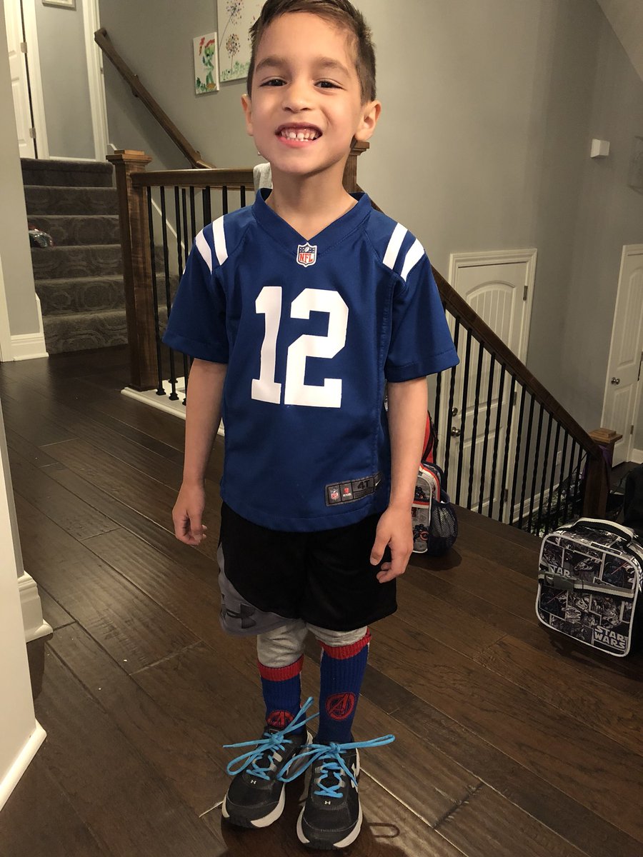 Look at this guy wearing Andrew Luck, Captain America socks and football leggings #alwayscold