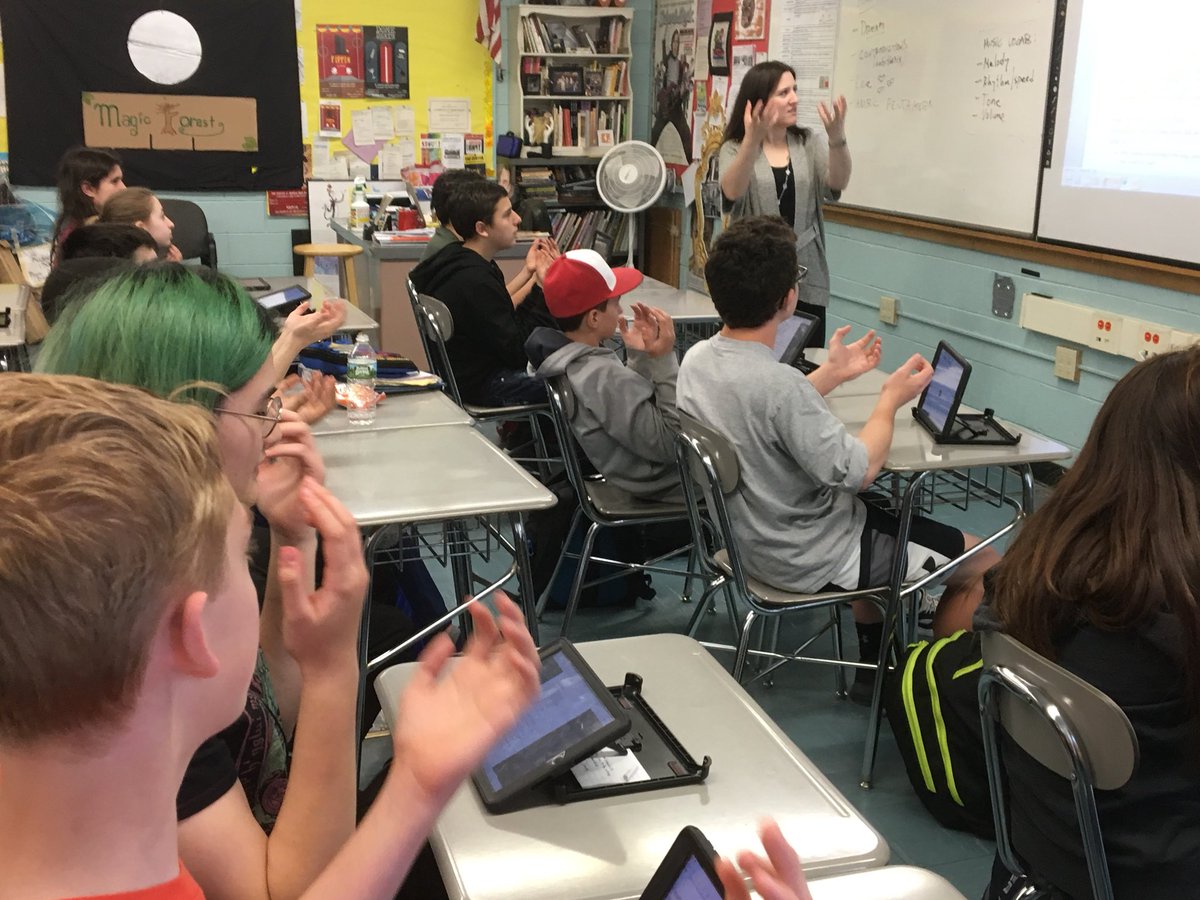dsmithela's tweet photo. As part of our chorus and English collaboration, Ms. Messina shows the kids how the music follows Shakespeare’s iambic pentameter in this song version of a sonnet.  The students’ projects based on this song/sonnet will be displayed at the concert on Wednesday... https://t.co/NsKLsl2Ean