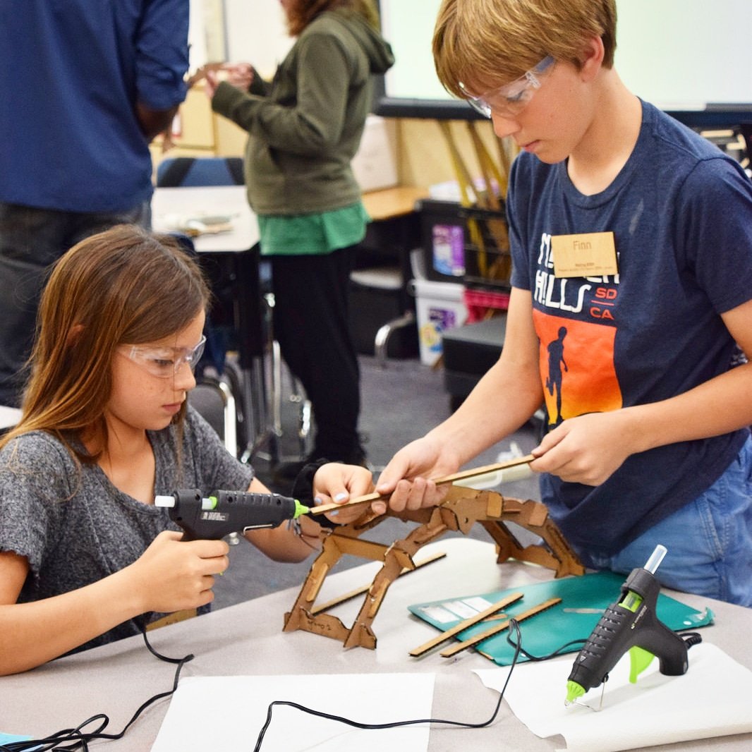 makingSTEM's tweet image. Remarkable Makers use teamwork to build their bridge during the Making STEM engineering challenge #stem #stemchat #edtech #stemEd #weneedmore