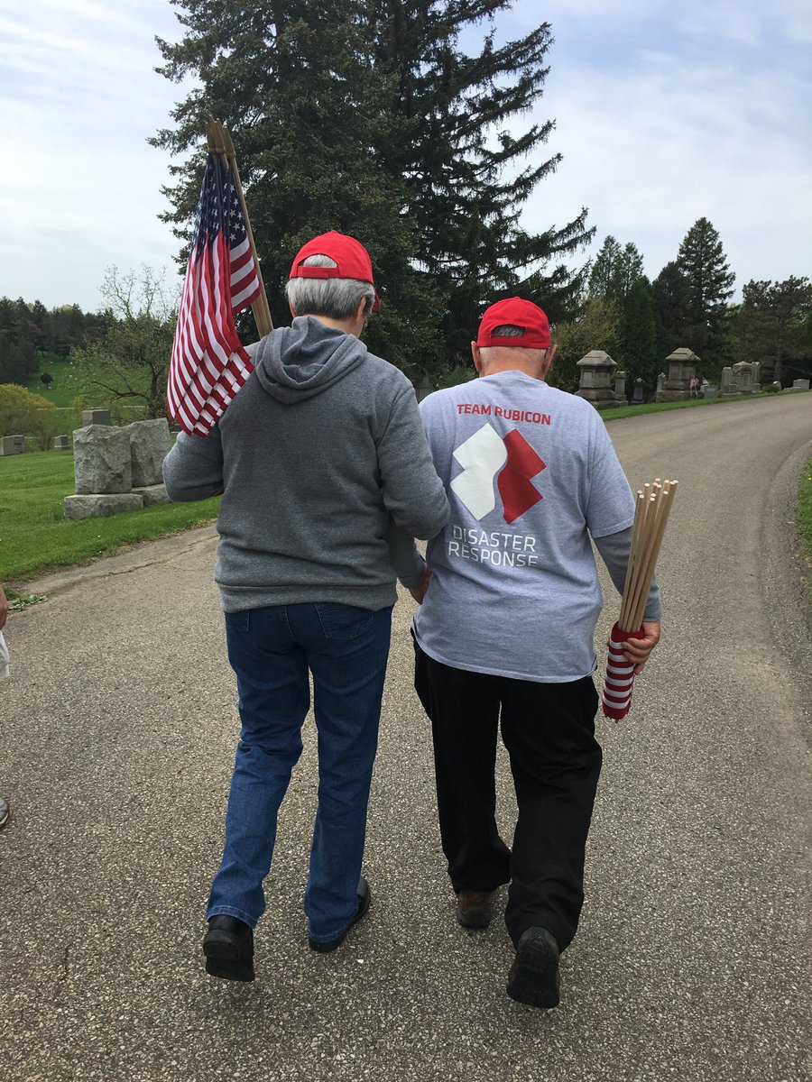 MichelleUfner's tweet photo. Team Rubicon greyshirts helped place over 5500 American flags on the tombstones of Vets at Washington Cemetery in Washington, PA today in preparation for Memorial Day. Thanks to greyshirt, Miles Glotfelty, and his wife, Pam, who organized the event! @TeamRubicon @TeamRubicon_3 https://t.co/CMs9yCzBfN