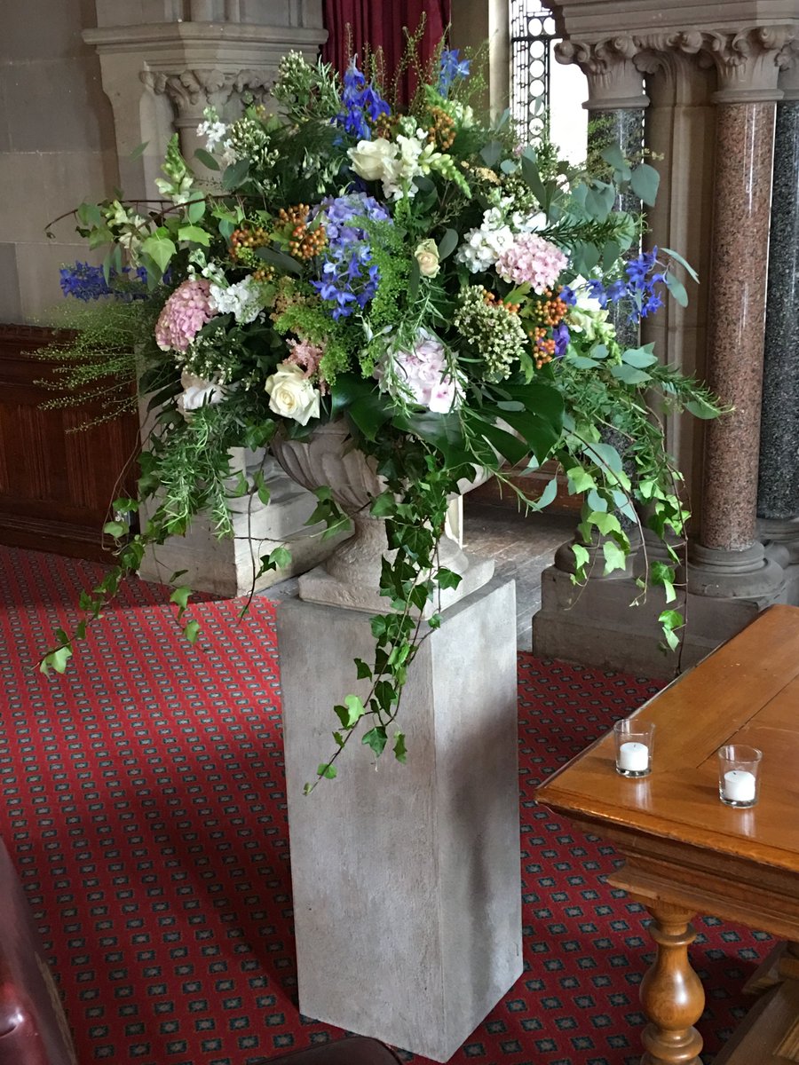 Rambling garden style urns can be used in the ceremony, and at the reception. These ere used to frame the couple as they got married and were then moved onto the reception and were placed either side of the band staging.