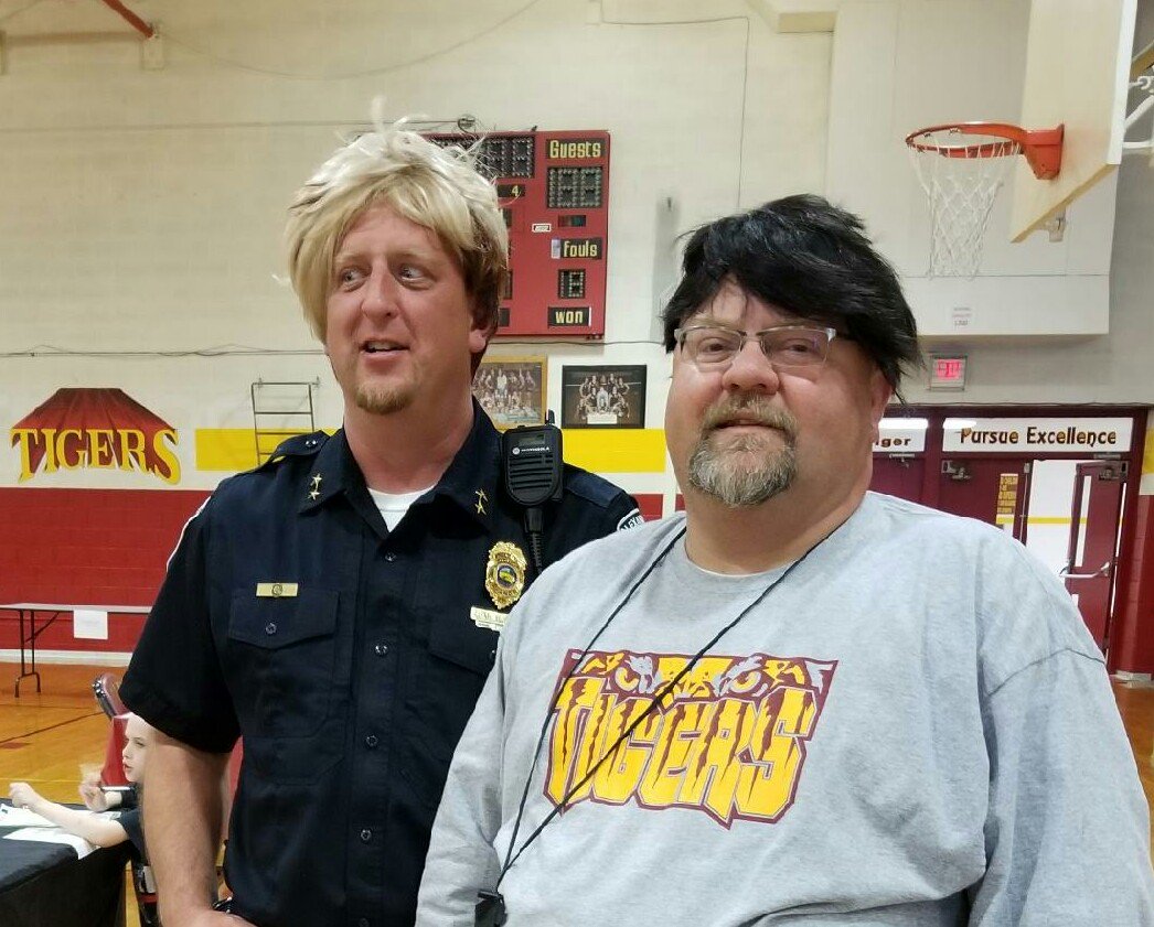 CraigAHowe2's tweet photo. We had some fun at Career day too! The wigs were a big hit today! #AlexEdChat #flyhighfri https://t.co/Vyj0WbafVa