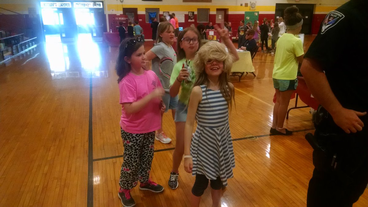 CraigAHowe2's tweet photo. We had some fun at Career day too! The wigs were a big hit today! #AlexEdChat #flyhighfri https://t.co/Vyj0WbafVa