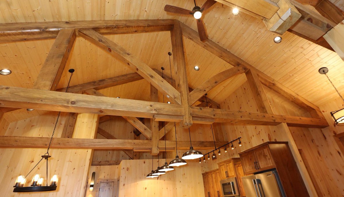 Collyerconstruc's tweet photo. This kitchen is a stunner!  With incredible beam work, and a priceless view of the lake, you can bet this is the centrepiece of this lakefront home. https://t.co/DVoaaYuN0G