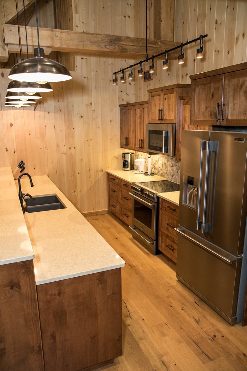Collyerconstruc's tweet photo. This kitchen is a stunner!  With incredible beam work, and a priceless view of the lake, you can bet this is the centrepiece of this lakefront home. https://t.co/DVoaaYuN0G