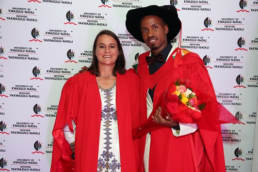 UKZN's tweet photo. Dr Melkamu Kassa was shot and wounded, imprisoned and spent three days in a forest without food, water or shelter while doing research in Ethiopia for his doctorate from UKZN.

Read more: https://t.co/nCMvULS9EE
#UKZNGrad2018 https://t.co/WtYmQ6cM2x