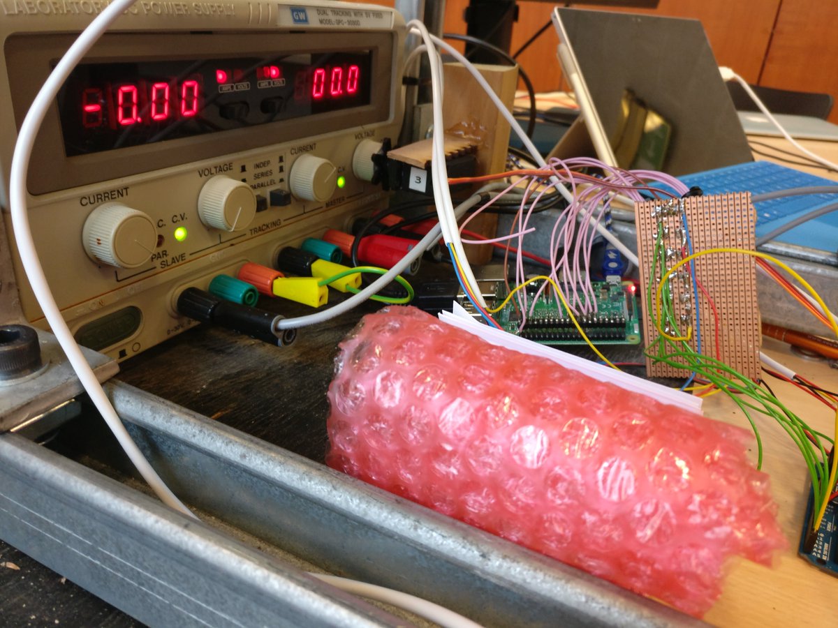 SamDWalder's tweet photo. In a pinch you can make a controllable voltage source with a servo hot glued to the knob of a bench power supply (not recommended) @UoBEEES https://t.co/maGfS1WAYO