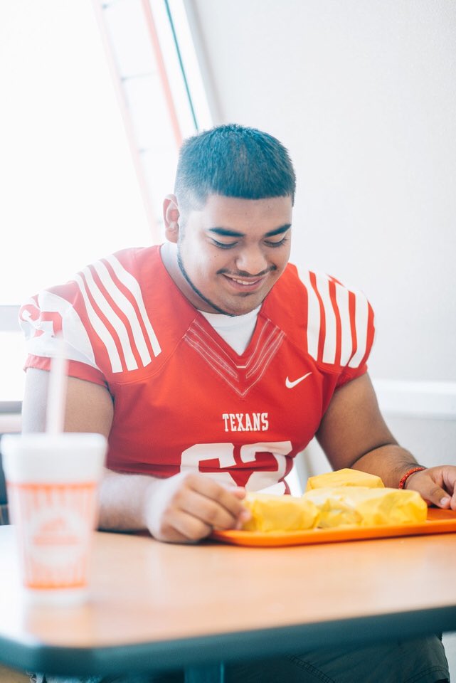 SorryImTexan's tweet photo. Only a Texan would take senior pictures at Whataburger https://t.co/YxN0c8DhqG