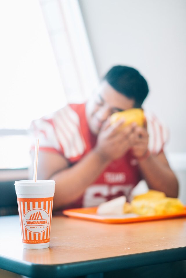 SorryImTexan's tweet photo. Only a Texan would take senior pictures at Whataburger https://t.co/YxN0c8DhqG