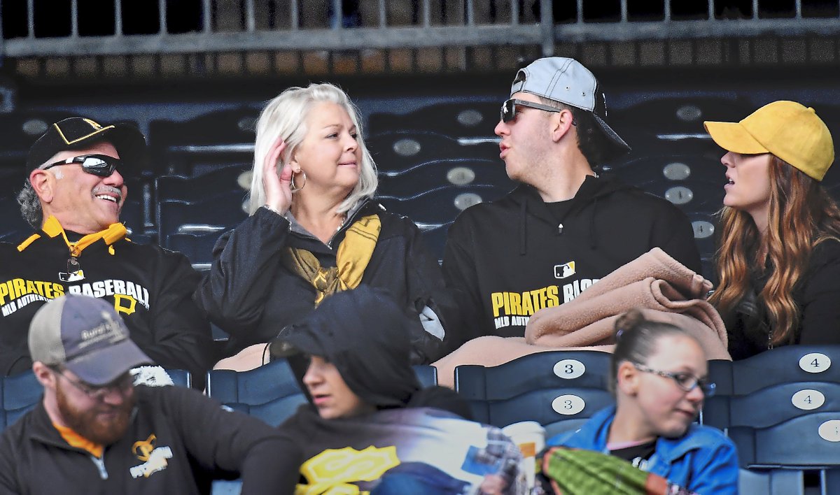 On Friday, Don and Roxane Kingham watched one son, Nolan, pitch for Texas at WVU. On Sunday, they saw their other son, Nick, take a perfect game into the 7th in his MLB debut. I went to both games to tell the story of a weekend the Kinghams won't forget.

post-gazette.com/sports/pirates…