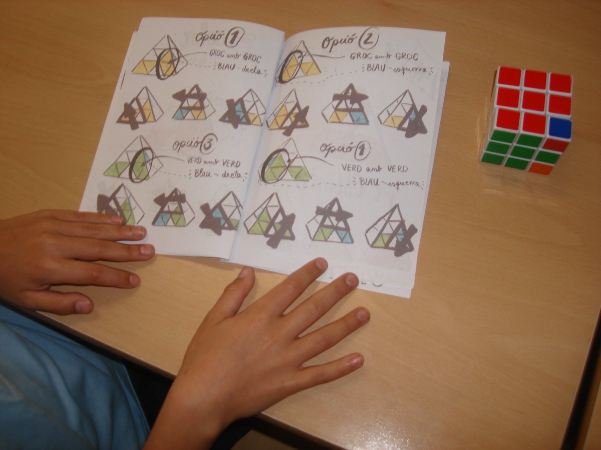 MareJaner's tweet photo. PRIMÀRIA: Els alumnes de 4t han realitzat un taller sobre  com fer el cub de rubik pyramidal. És un joc que vincula les matemàtiques tot ensenyant lògica, raonament, potencia la curiositat, la memòria i la visió espacial. @rubikids https://t.co/YWKjWyE2m9