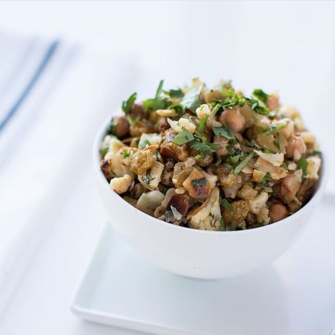 Guilt-free and damn delicious. Get this roasted cauliflower and chickpea salad for lunch.
