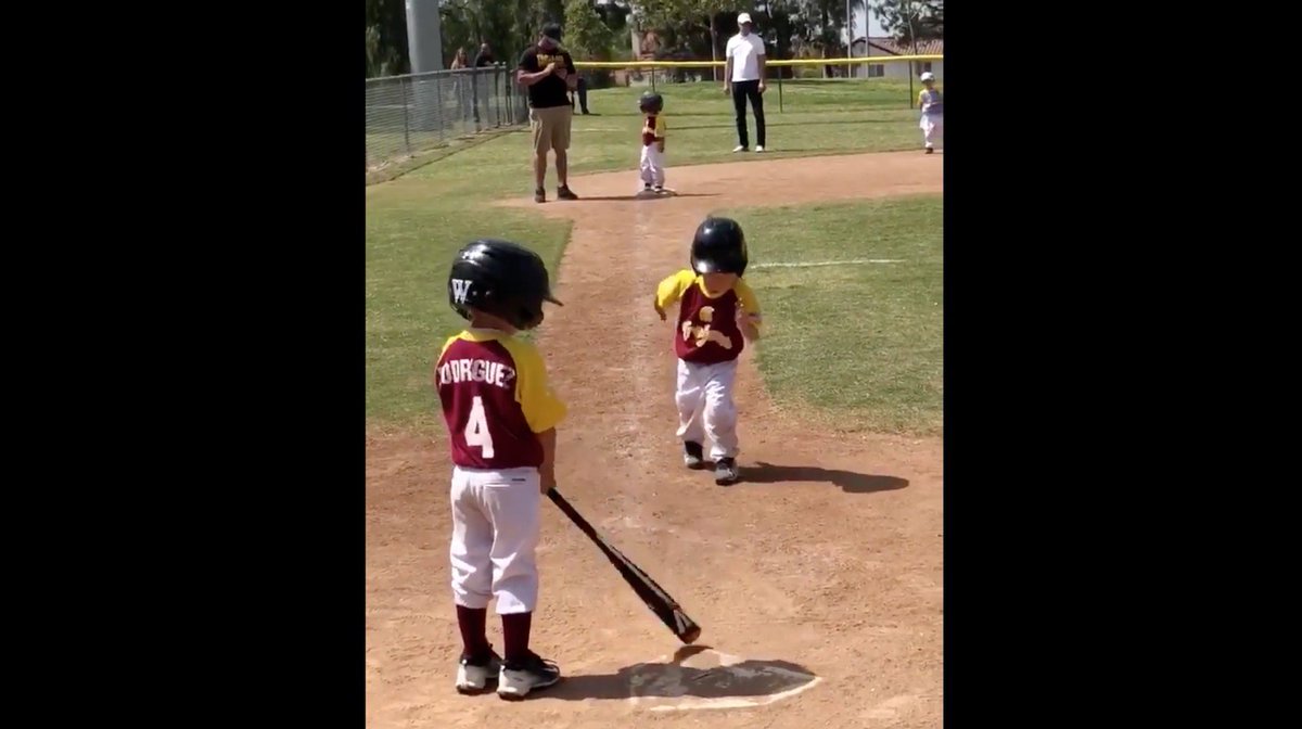 Deadspin's tweet photo. VIDEO: Baseball child cannot be stopped from dragging out his moment of glory https://t.co/29qj3VDi8b https://t.co/9E0HZ6PbQP