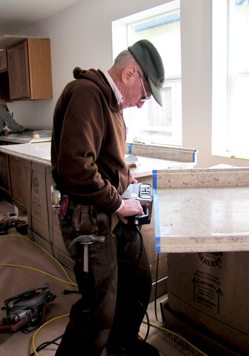 BentonHabitat's tweet photo. Long time volunteer Don Amort, who has over 550 hours at our new home constructions sites, preparing a counter top for installation. https://t.co/4hLD8mV2oU
