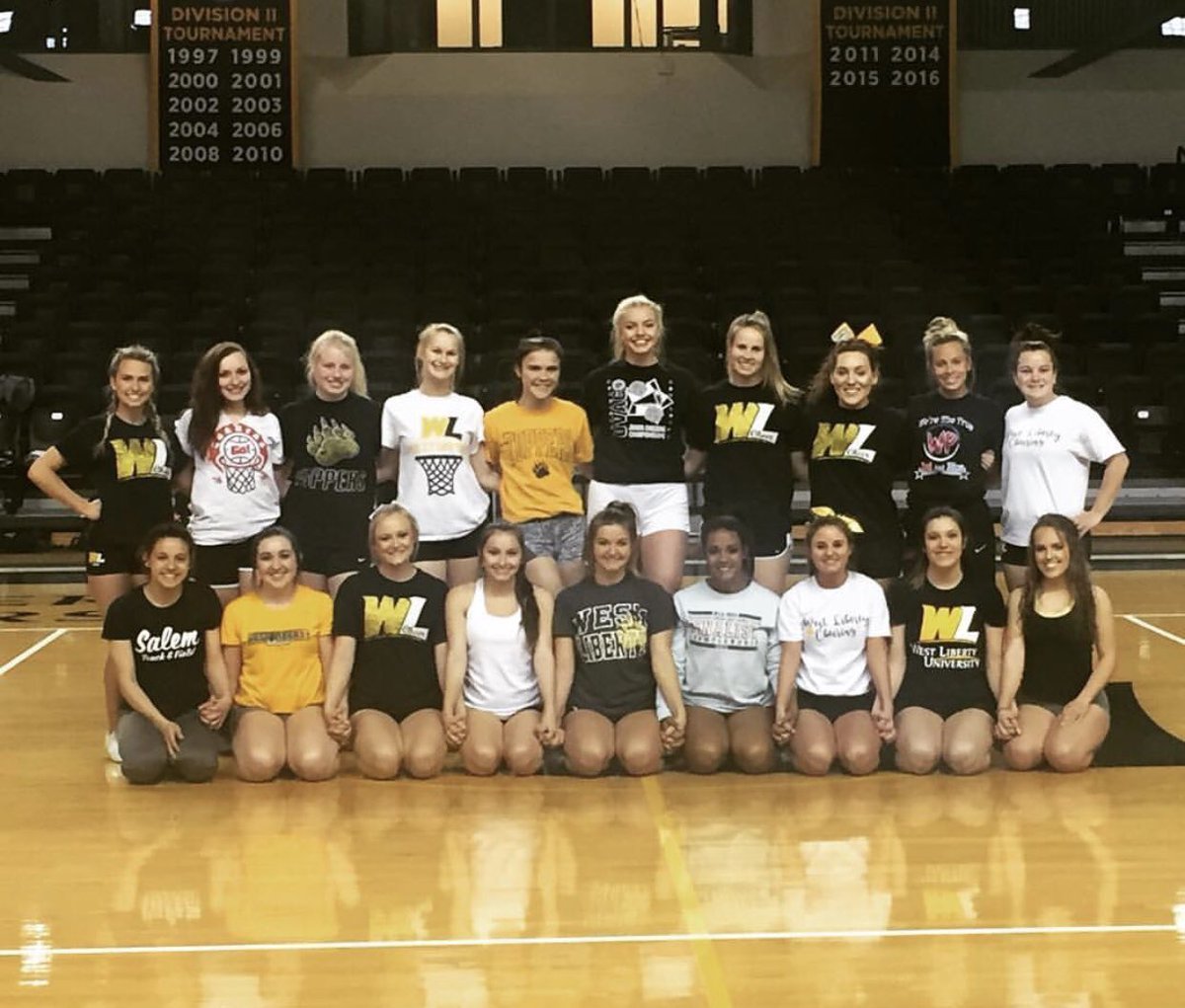 WLU_Cheer's tweet photo. WLU cheer 2018-2019!!!!💛🖤🐻 https://t.co/nnCmbxW2L3