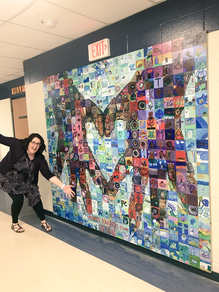 StMargueritecs's tweet photo. @STMCounsellor is showing off our new mural put together by @MuralMosaic “Hearts and Hands for Jesus!” https://t.co/w09UhNQYzu