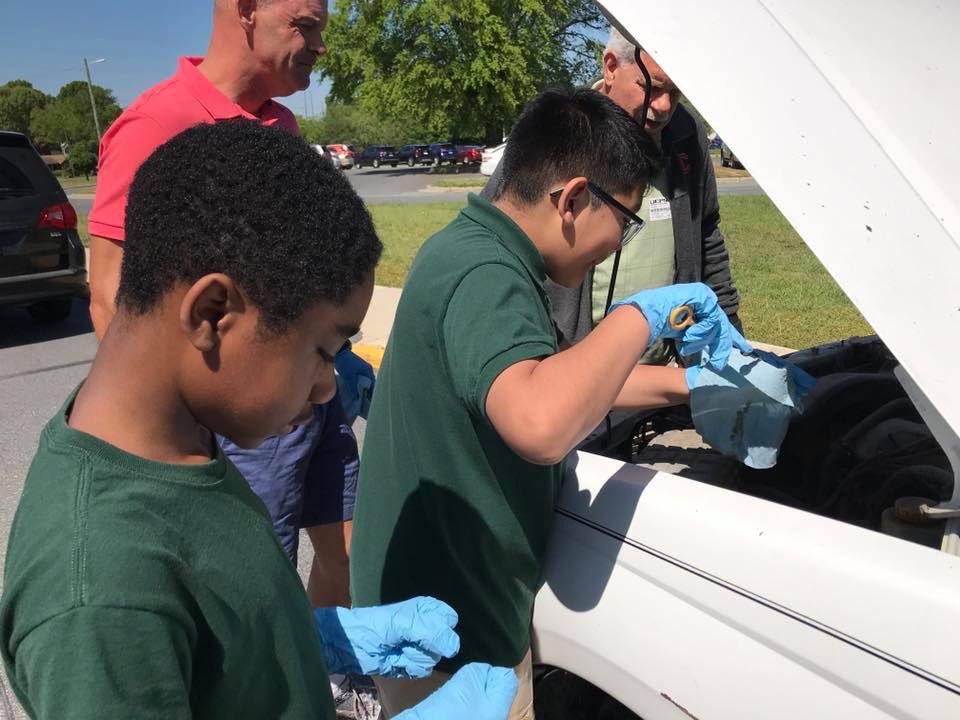 TheCathermans's tweet photo. Health Sciences Academy at Monroe Middle School @1MClubs #MenintheMakingClubs is learning all about cars in the month of May! Today was how to check the oil, fluids, and tire pressure. https://t.co/UqkX699rnr #TheManualToManhood book #buildingconfidence #MentoringMatters https://t.co/MhBxQ5FwiX