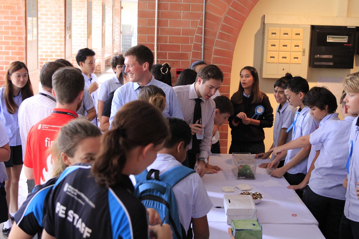RegentsSchool's tweet image. Year 8.1 have been taking bids to act as PAs to teachers for a day to raise money for Elephant Nature Park. Here they are answering questions and demonstrating their skills. We even had a student bring his pet snakes in to showcase his snake handling skills! #GoRISPSecondary