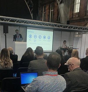 NHSSupplyChain's tweet photo. Howard Blackith, Programme Director @DHSCgovuk opens the day @Health_GB with his keynote speech: Transforming healthcare procurement #HealthGB https://t.co/JqiI4i0ISw