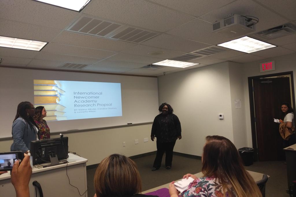 realsocialwork's tweet photo. Great work @TarletonSOCW seniors Candice, Kristina, and Lonnetta sharing their work with International Newcomers Academy. @DrNJonesTSU https://t.co/rRFivXLmOq