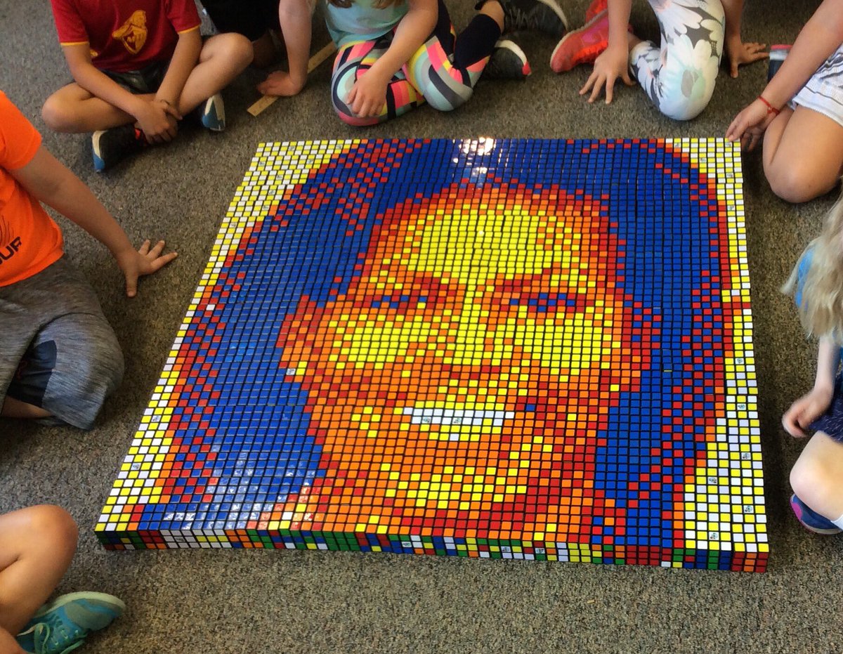 SkiLawson's tweet photo. @MichelleObama students chose to build a mosaic of your face. So beautiful even in Rubik's Cube! https://t.co/2nB6ZlTuFf