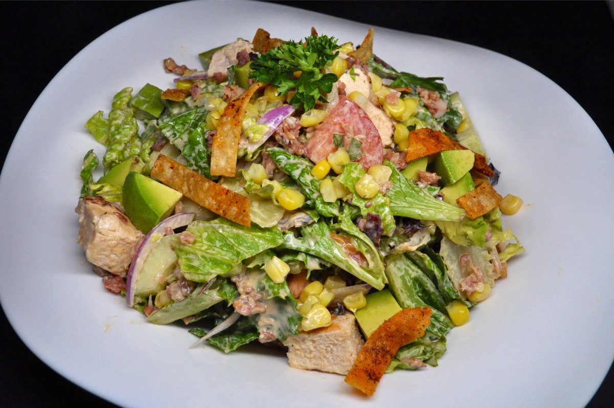 It's the perfect day to enjoy our refreshing Chicken Packing House Salad with Spring Mix, Corn, Avocado, Red Onion, Roma Tomatoes, Bacon, Cucumbers, tossed with Chili Lime Ranch Dressing and topped with crispy Tortilla strips! #WeeklyLunchSpecial