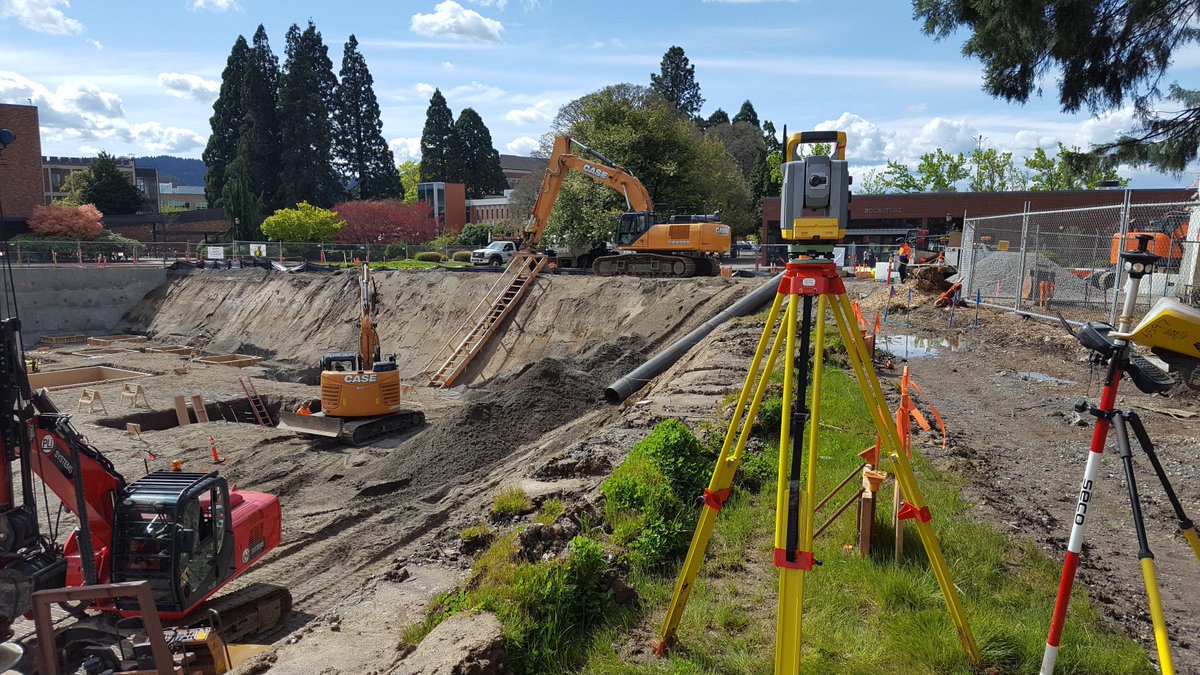AKS_Engineering's tweet photo. It's Total Station Tuesday! Here is Gunner on the job at @UPortland. He's a big fan of higher education!  Thanks Robert Mayton for the submission. #universityofportland #AKSEngineering #TotalStation https://t.co/SpcLoai8Vj