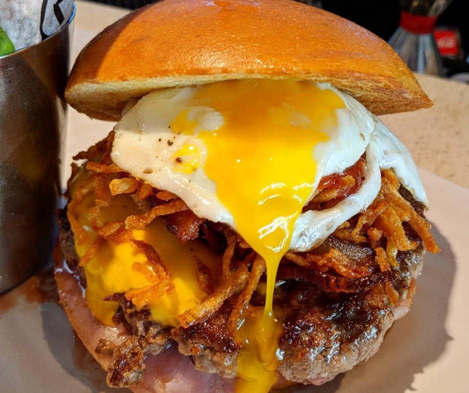 LibertyBurgerWY's tweet photo. "Happy Noon!" - All the goodness of the sunrise – applewood-smoked bacon, ham, hashbrowns and a fried egg – stacked into one meaty meal.
.
.
.
#Noon #HappyNoon #Burger #EatBurger #Hashbrowns #Cheese #Sunnyegg #Egg #Bacon #Beef #Bun #Breakfast #Burger #Hamburger https://t.co/mPC9FyJ4LV