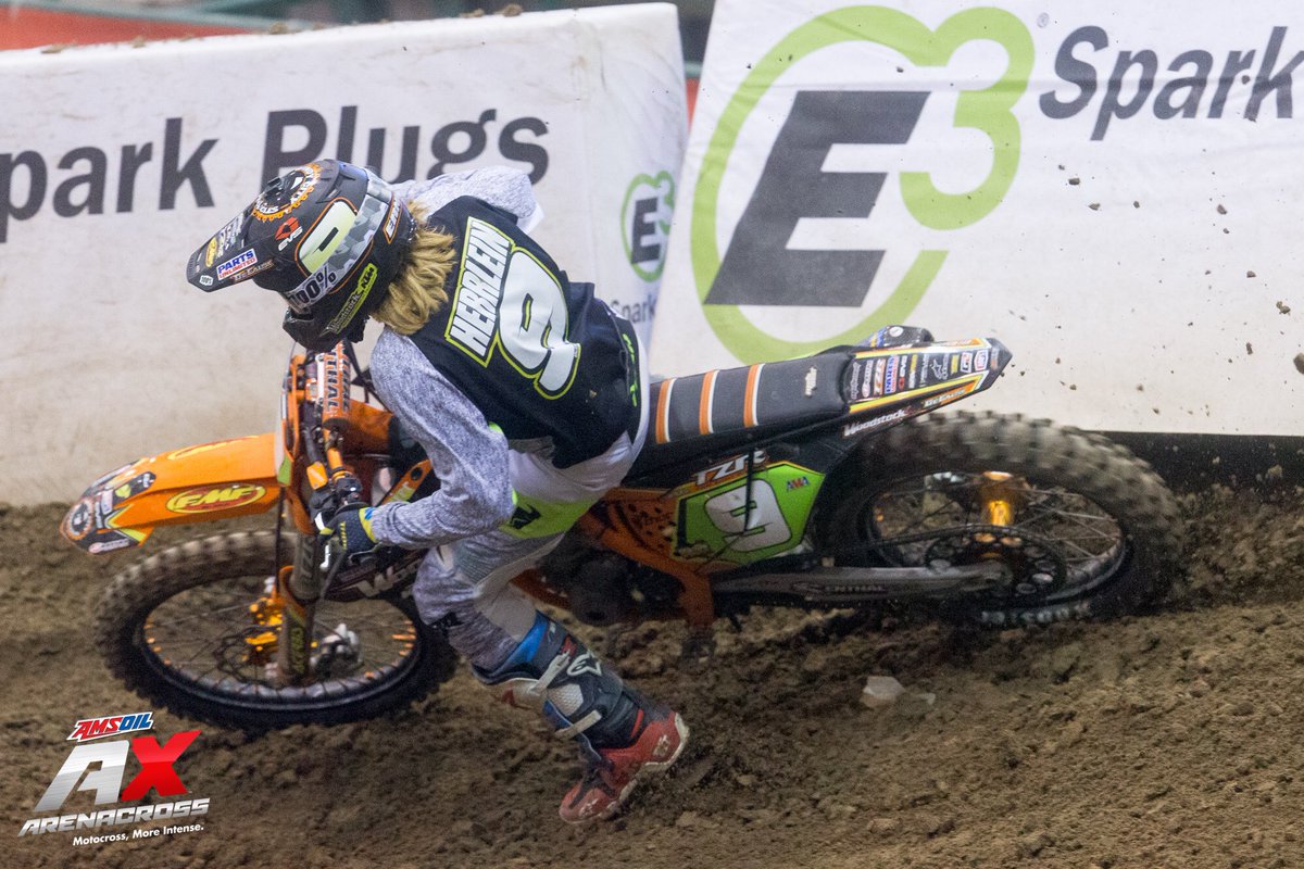 Arenacross's tweet photo. Last weekβs 250AX winner @DanielHerrlein shreds the @e3sparkplugs berm for #TurnTuesday! π₯ #AMSOILAX https://t.co/kqR2aO9EDl