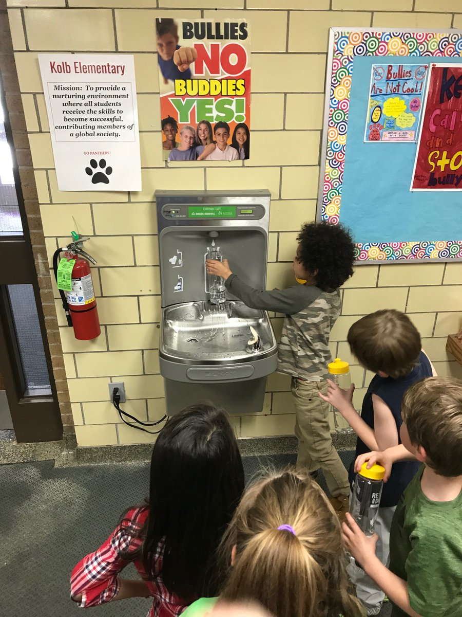 KolbSchool's tweet photo. Mrs. Crawford’s classroom counted out and delivered water bottles to all Kolb students. Thank you Delta Dental &amp; MESSA for the new water bottle filling stations and the water bottles for our students &amp; staff! (Mrs. Anderson's class tests the new system out!) @DeltaDental #messa https://t.co/bnACFBOBfv