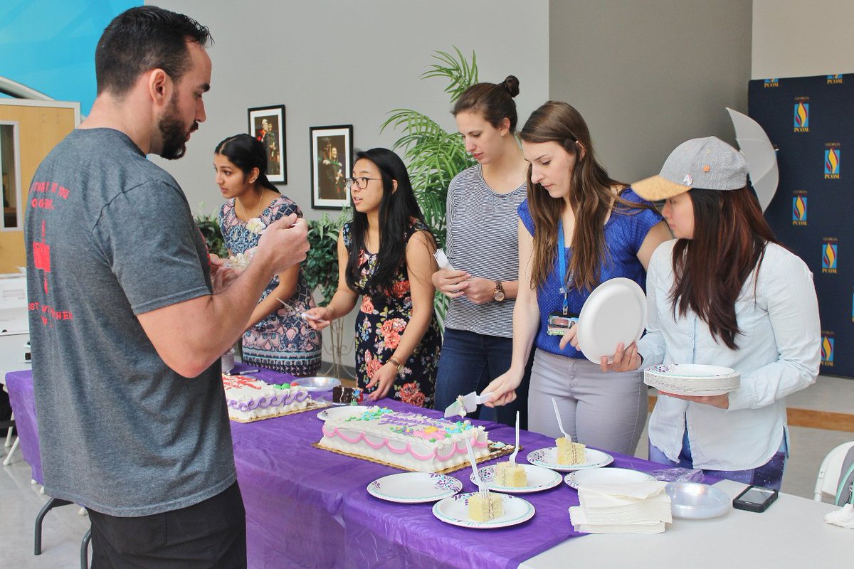 PCOMGeorgia's tweet photo. Throughout last week the DO Council displayed their passion for the osteopathic profession with continued celebratory events in honor of #NOMWeek18. They served cake in a gesture of appreciation for the campus community, providing a sweet study break to those preparing for exams. https://t.co/czSiMoglEN